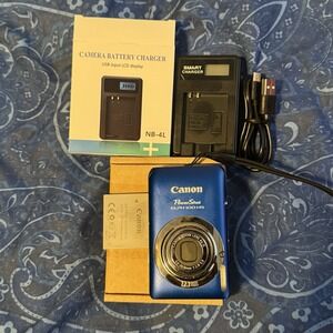 Canon Powershot ELPH 100 HS 12.1mp Digital Camera Battery Charger & 2GB SD Card